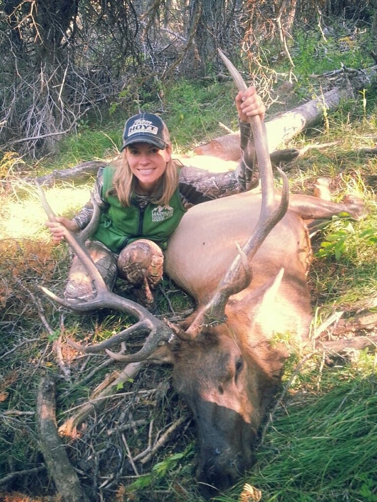 Young Lady with harvested Elk